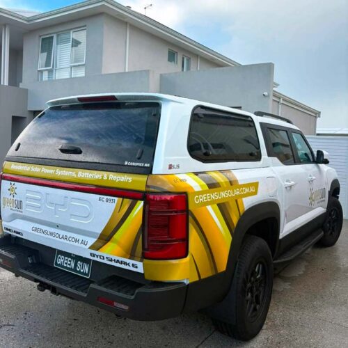 Green Sun Solutions BYD electric ute Green Sun Solutions BYD electric ute parked outside a home